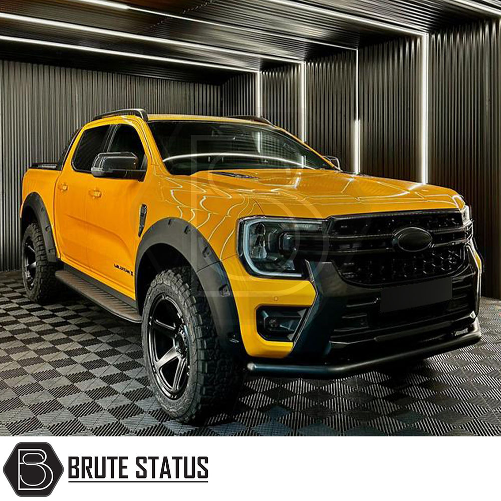 Ford Ranger T9 2023+ City Bar (Nudge Bar) Matt Black shown installed in a garage, highlighting bumper protection and sleek design for enhanced vehicle aesthetics.