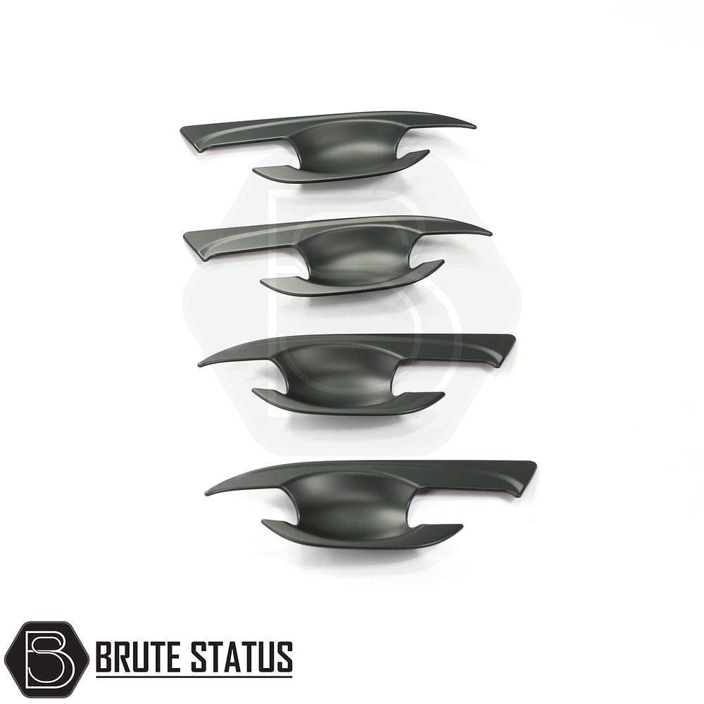 Nissan Navara NP300 2015-2022 Matt Black Door Handle Inserts, set of four, easy installation with 3M adhesive, enhances truck style and individuality.