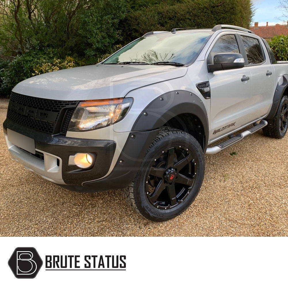 Ford Ranger Roof Rail Kit 2012-2022 installed on a silver truck, showcasing its fit and design for enhancing vehicle utility and style.