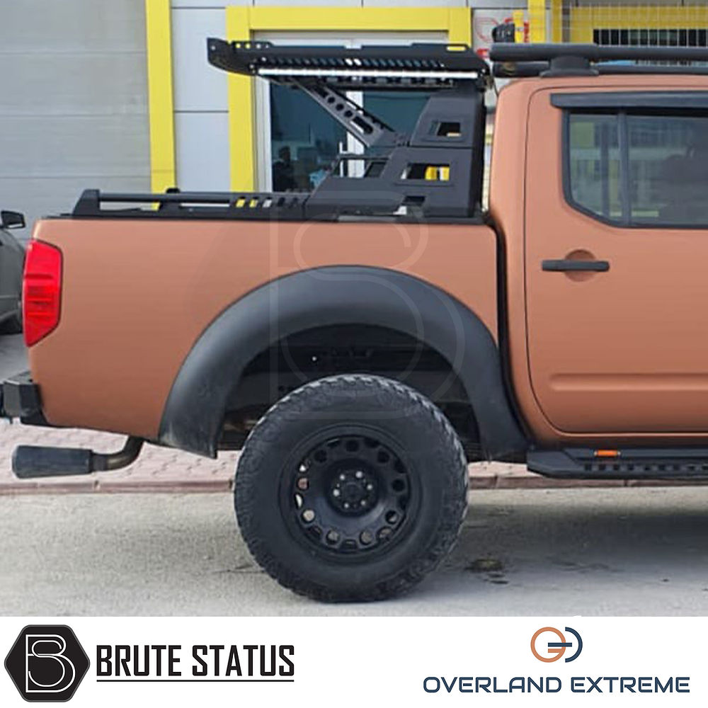 Nissan Navara D40 2010-2015 Overland Extreme Wide Arch Kit displayed on a brown truck, showcasing premium wheel arches for enhanced vehicle styling.