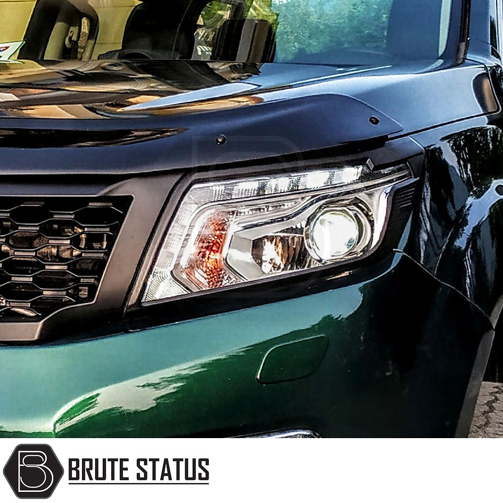 Nissan Navara 2015-2022 NP300 D23 Headlight Cover Guard Matte Black, enhancing the truck's front with aggressive styling, perfect for customization enthusiasts.