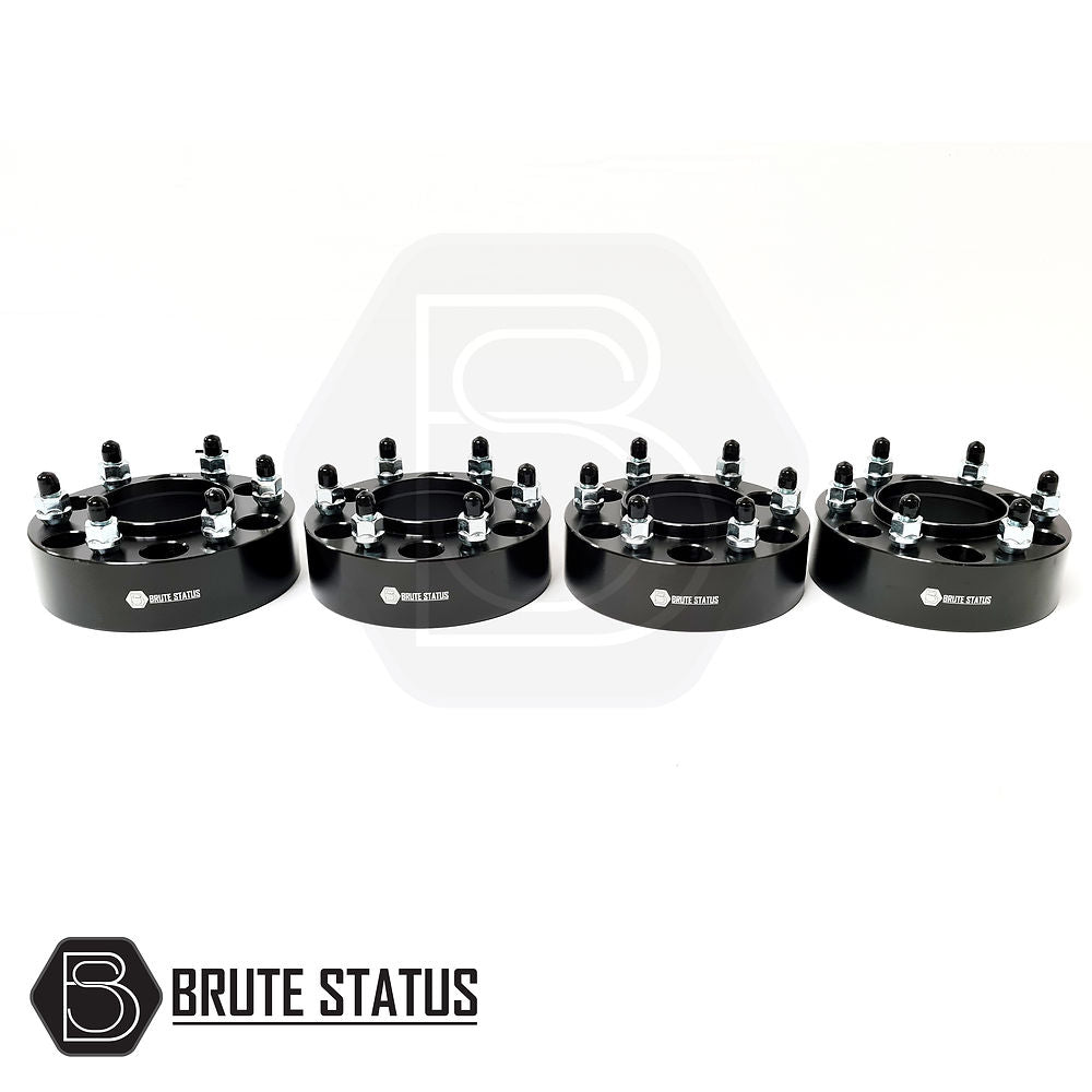 Mitsubishi L200 2006-2021 50mm hubcentric wheel spacers, set of 4, featuring black metal construction with bolts and nuts for enhanced vehicle stability.