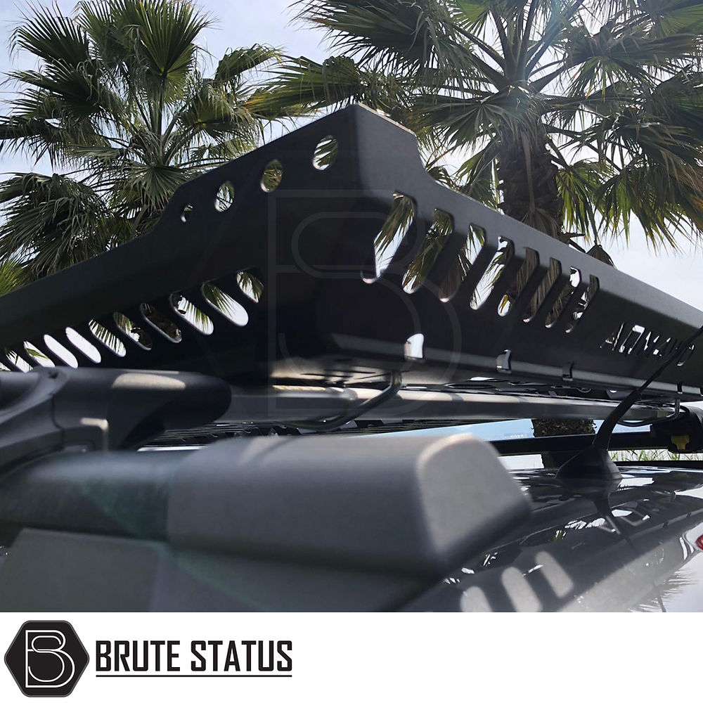 Universal Roof Basket (Combat Style) on a truck, featuring a matte black finish and heavy-duty steel construction, designed for easy installation without drilling.