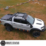 Universal Roof Basket (Combat Style) on a parked truck, featuring a heavy-duty matt black finish and mounting points for lights, ideal for trucks with cross bars.