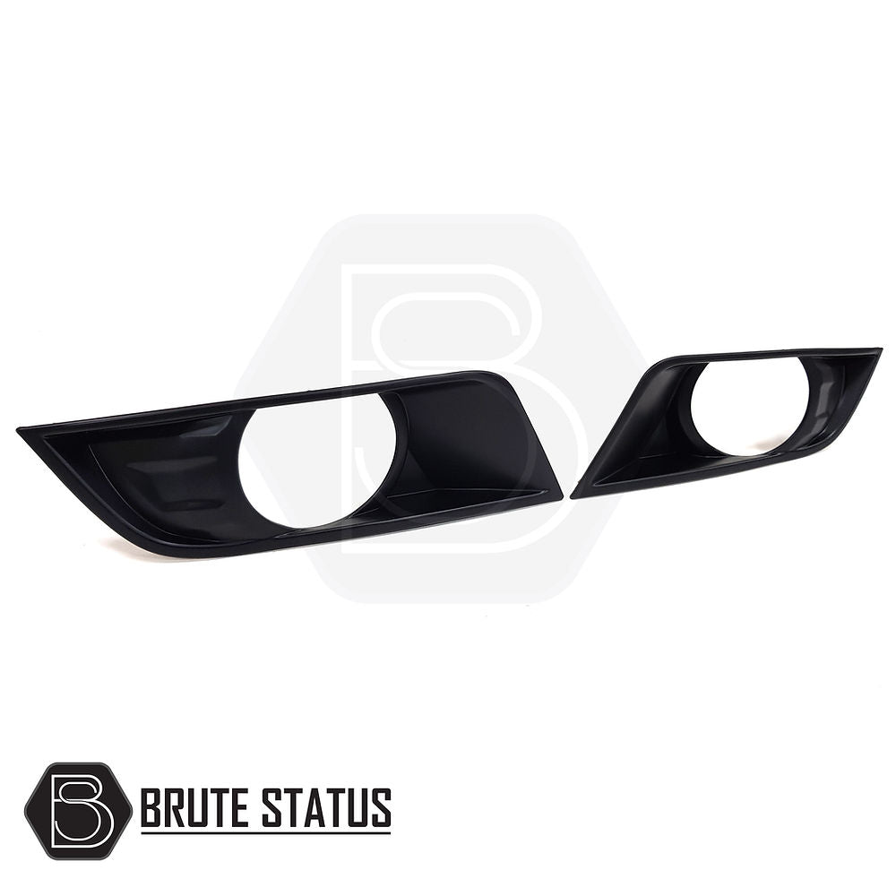 Ford Ranger 2015-2019 T7 Fog Light Covers (Round) Matte Black, featuring a sleek design with a black handle and hexagonal emblem for an aggressive, standout look.