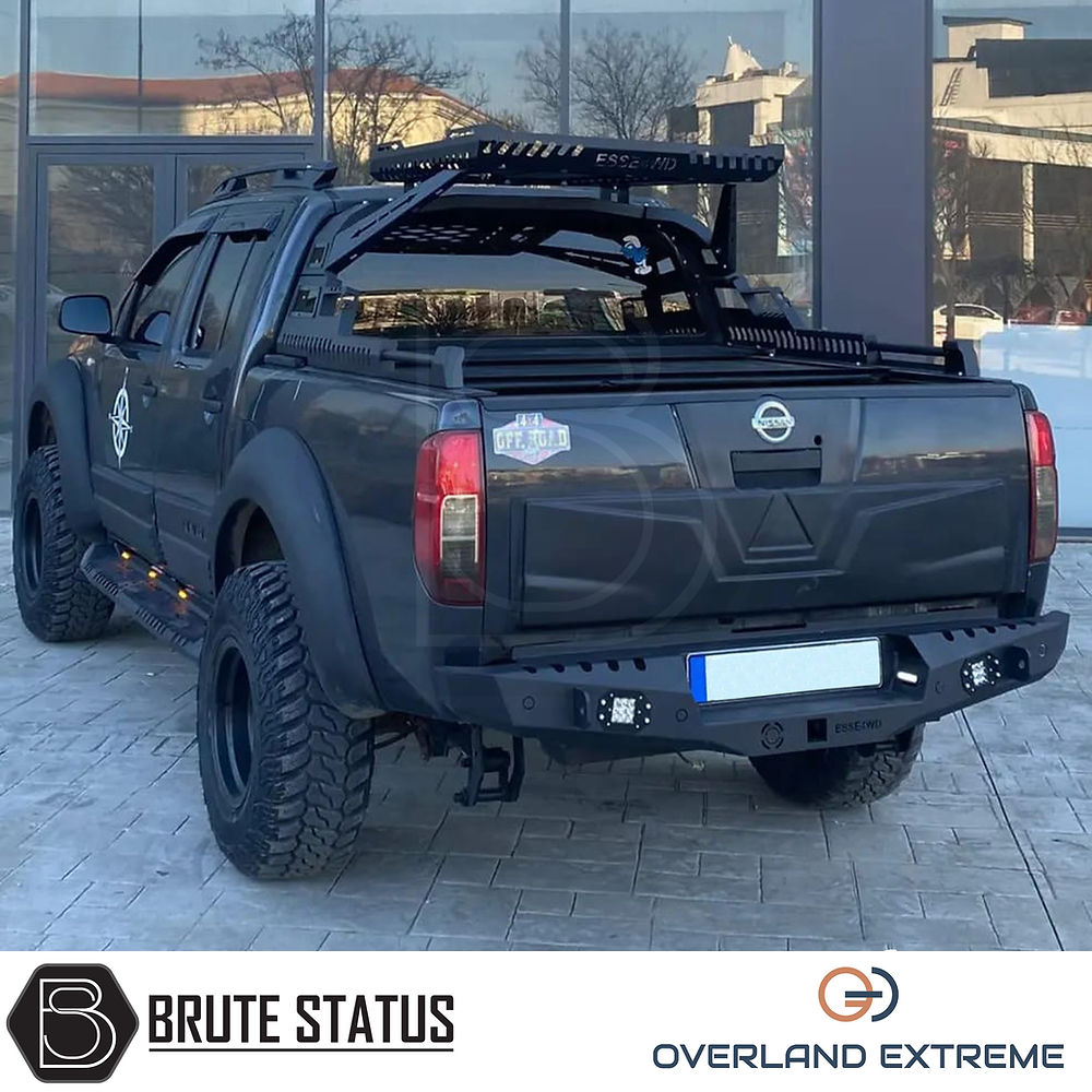 Nissan Navara D40 2005-2010 Overland Extreme Wide Arch Kit on a black truck, showcasing premium wheel arches designed for durability and perfect fitment.