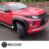 Head Light Covers for Mitsubishi L200 Series 6, enhancing the vehicle's aggressive look with premium ABS plastic, easy installation, shown on a red car.