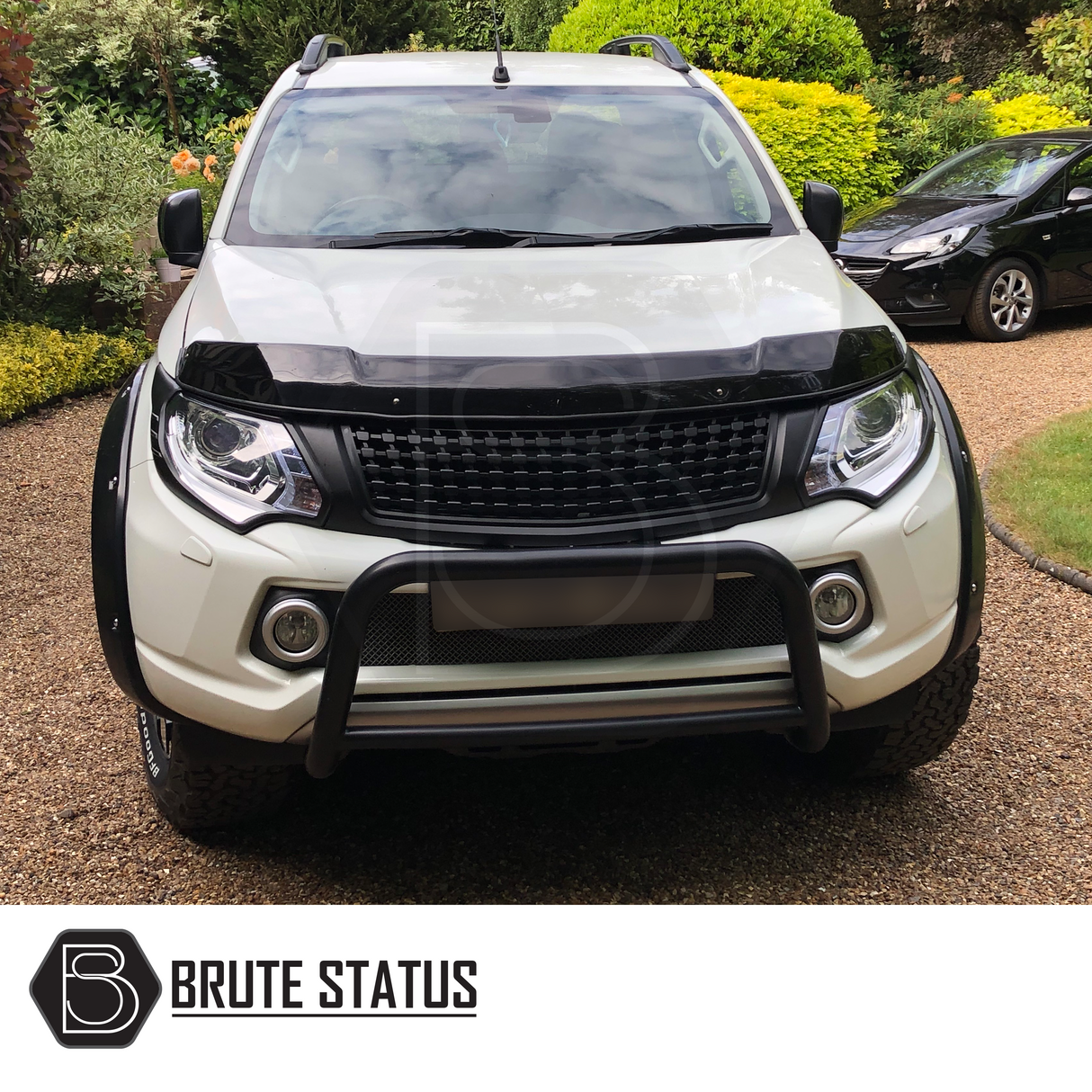 Mitsubishi L200 Series 5 2015-2019 Matte Black Grille, distinct design with smooth finish, enhances vehicle style and individuality, ready for installation.