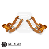 Toyota Hilux 2005-15 2 Lift Kit, featuring orange metal shock spacers and durable rear lift shackles designed for enhanced truck height and strength.