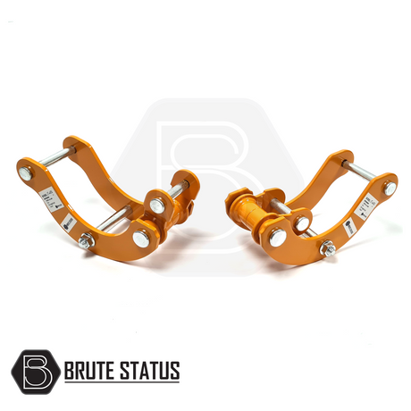 Mitsubishi L200 Series 5 2015-2019 2.5 Lift Kit, featuring orange metal shock spacers and heavy-duty rear lift shackles for enhanced truck elevation.