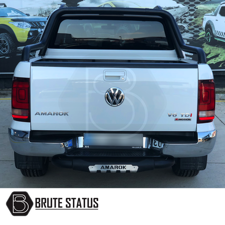 VW Amarok 2010+ Roll Bar in matte black, fitted on a white truck, showcasing its stylish, durable design for enhanced vehicle customization.