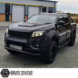 Isuzu D-Max 2021+ Heavy Duty S30 Steel Side Steps, featuring strong steel construction and matt black finish, mounted on a parked SUV, showcasing durability and sleek design.