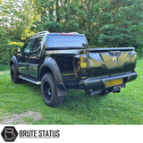 Nissan Navara NP300 2015-2022 Tailgate Cladding Cover/Protector in matte black, showcasing durable ABS plastic design for enhanced truck tailgate protection.