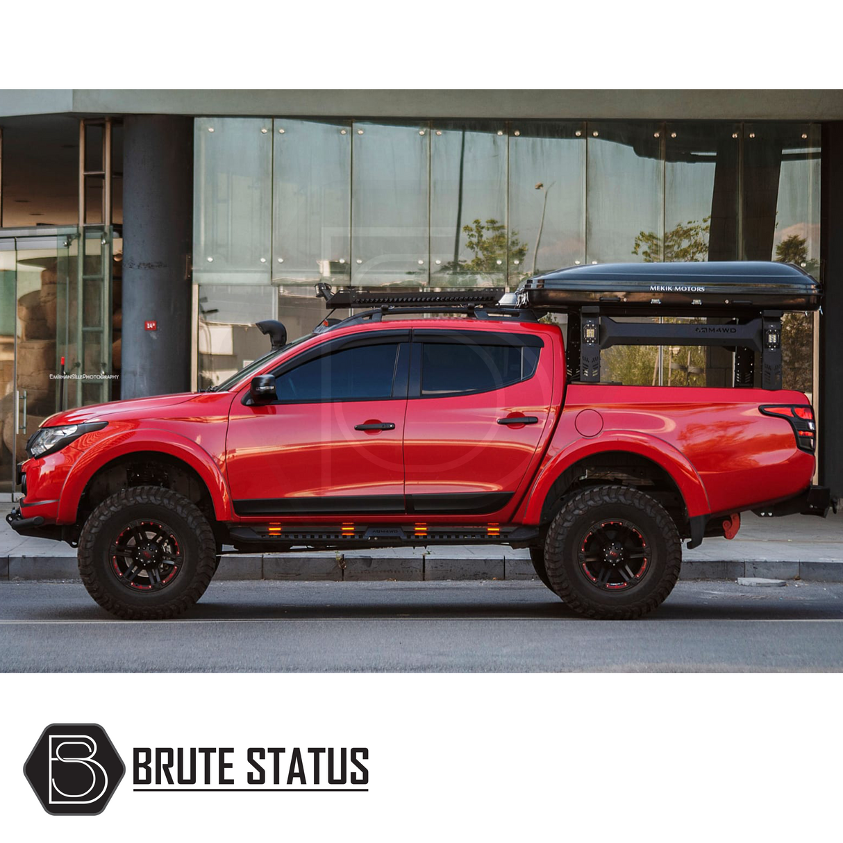 Universal S75 Tent Roll Bar on a red truck, featuring a black finish and LED lights, designed for European pickup trucks, enhancing outdoor utility.