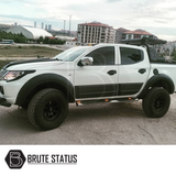 Mitsubishi L200 Series 5 2015-2019 Wide Arch Kit (Overland Extreme) on a white truck, showcasing premium wheel arches for enhanced style and functionality.