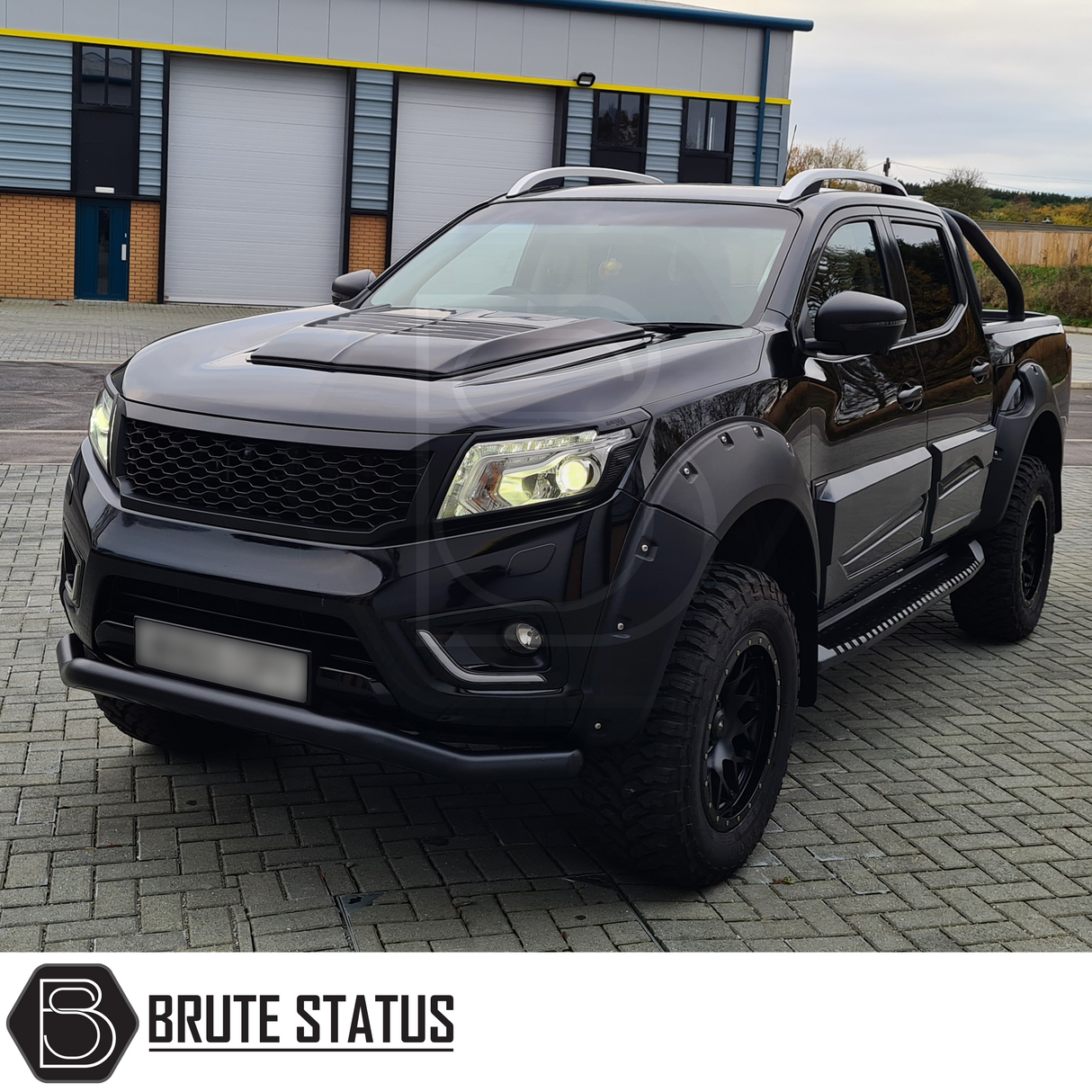 SsangYong Grand Musso 2018-2021 Heavy Duty S30 Steel Side Steps in matt black, shown on a truck, providing side protection and easy fitment.